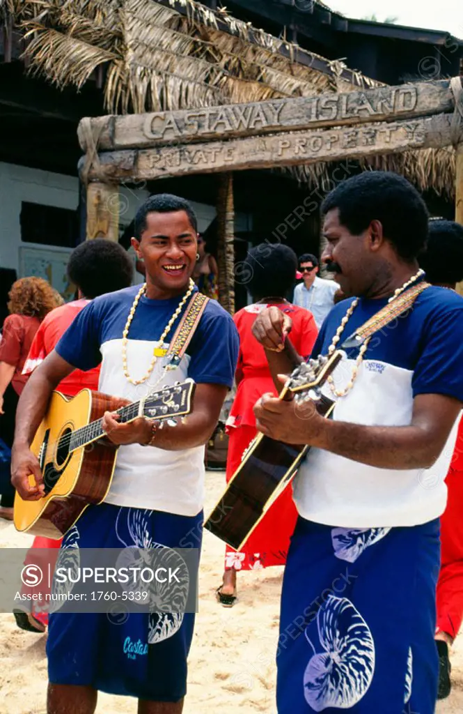 Fiji, Two Fijian men playing guitars