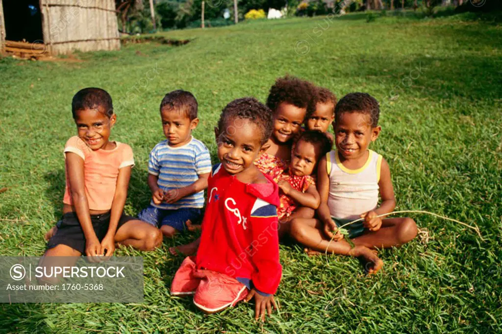 Fiji, Smiling children on grass