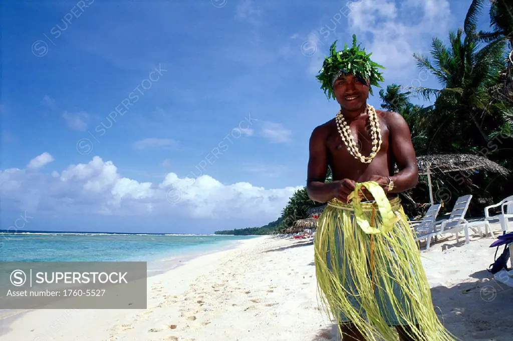 Guam, Urunao Beach, Jungle Beach Adventure guide in native dress on beach B1723