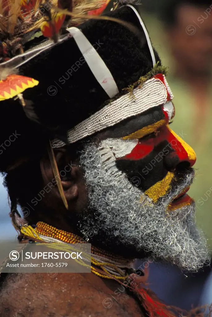 Papua New Guinea, profile portrait of man in tribal dress NO MODEL RELEASE