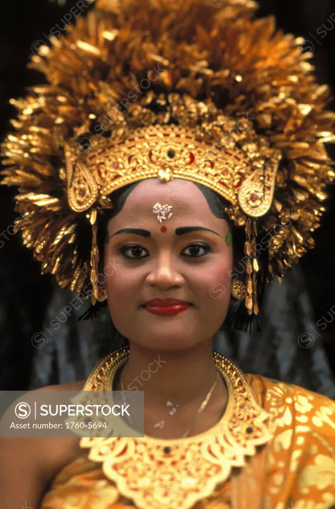 Indonesia, Bali, Headshot of traditional wedding bride in full headdress and costume NO MODEL RELEASE