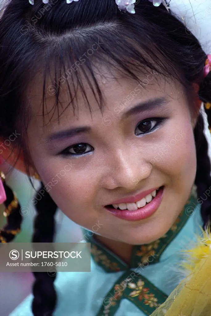 Singapore, Oriental girl with Chinese style dress, closeup portrait A71F