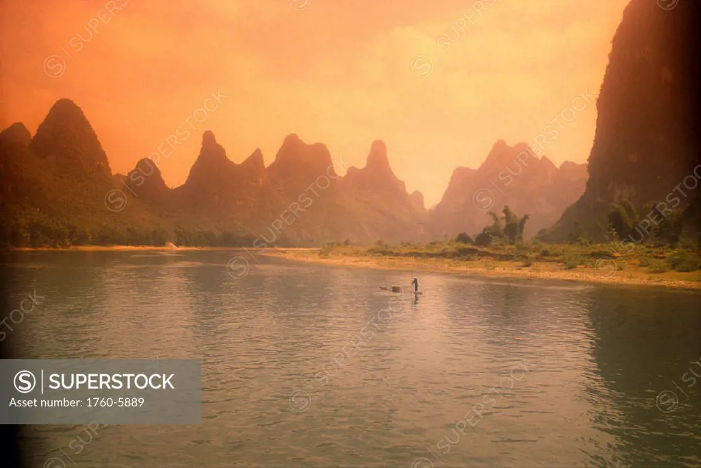 China, Limestone Mountains along Li River orange hues, Guilin C1855