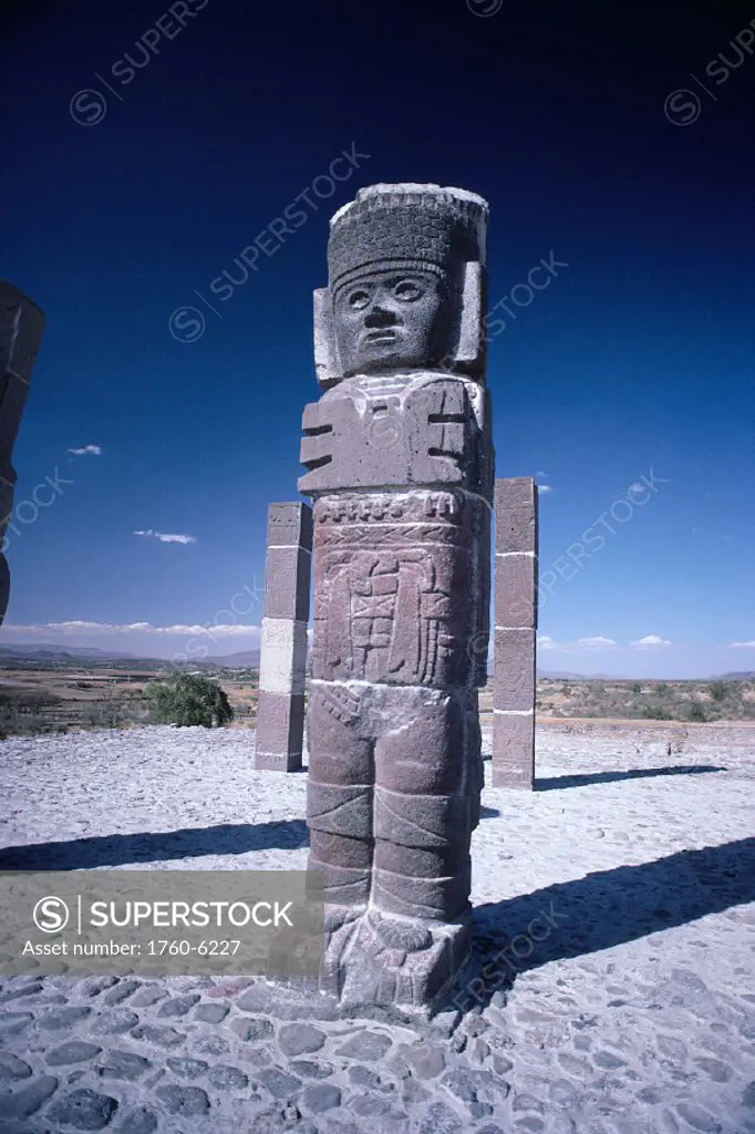 Mexico, Stone carving of Tula-Warrior Statue, shadow cast on ground A53B