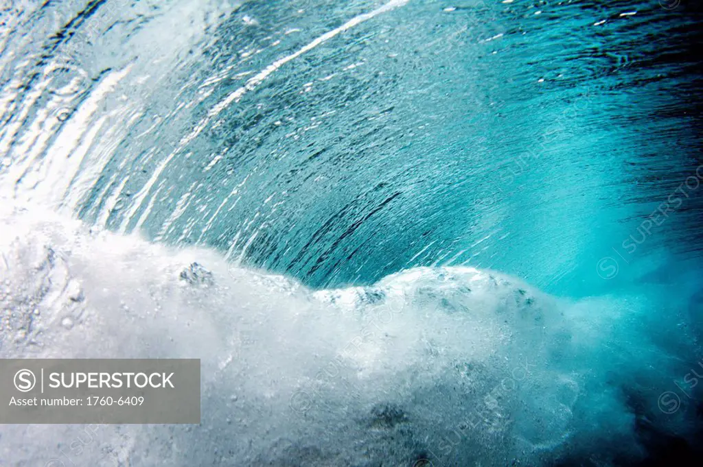 Hawaii, crashing blue underwater wave 