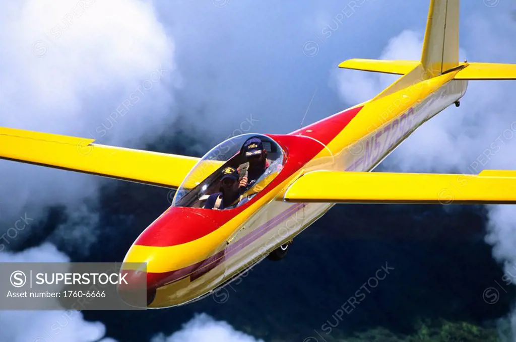 Hawaii, Maui, Yellow glider with two passengers 