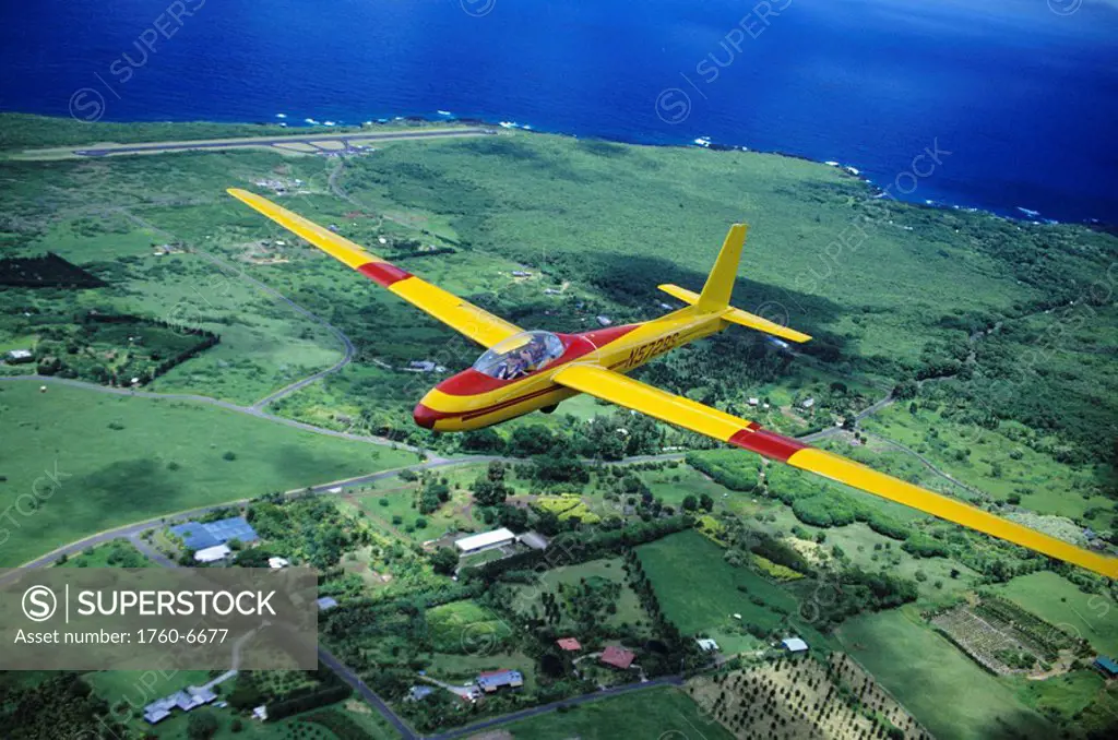 Hawaii, Maui, closeup of yellow glider over Hana, aerial view 