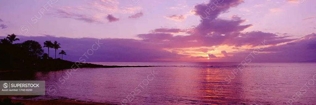 Hawaii, Maui, Kapalua Beach, Purple sunset over ocean.