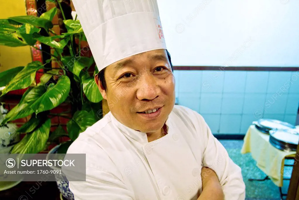 China, Beijing, Head chef at Quanjude Roast Duck Restaurant.