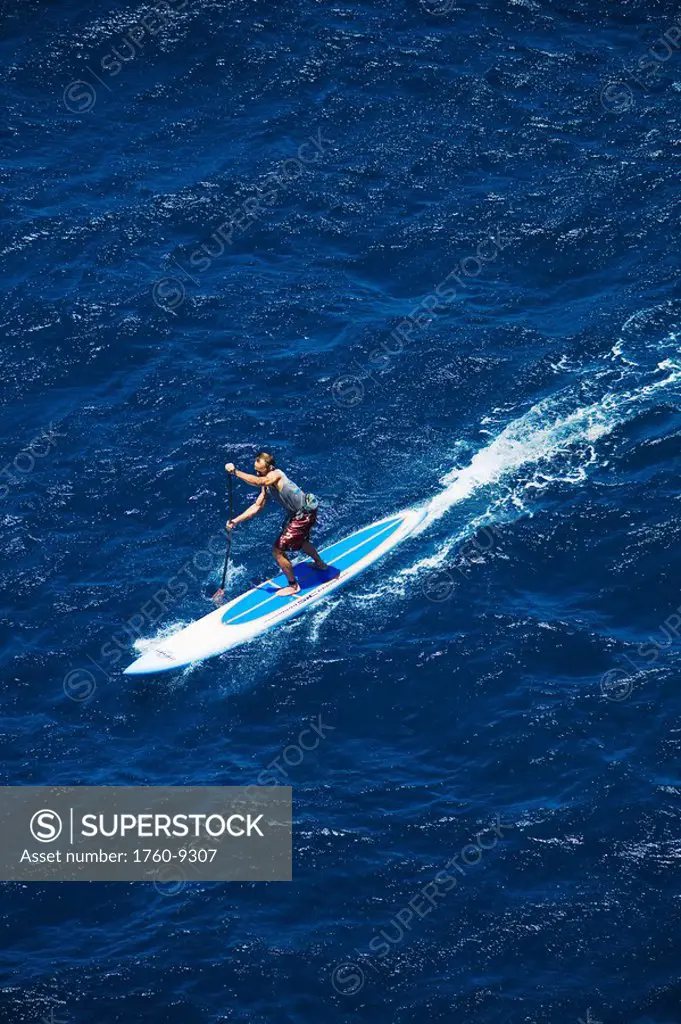 Hawaii, Maui, North Shore, Mark Raaphorst stand up paddling.