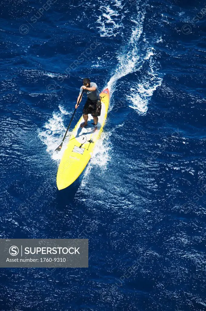 Hawaii, Maui, North Shore, Igor Krtolica stand up paddle boarding in 2008 Naish International Paddleboard Race.