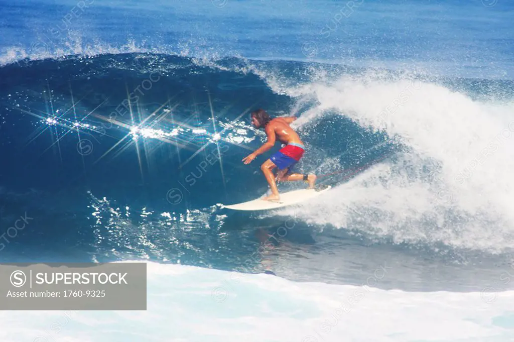 Hawaii, Oahu, North Shore, Pipeline, surfer, riding a wave.