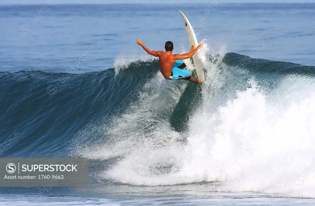 Hawaii, Oahu, North Shore, Pipeline, surfer, riding a wave.