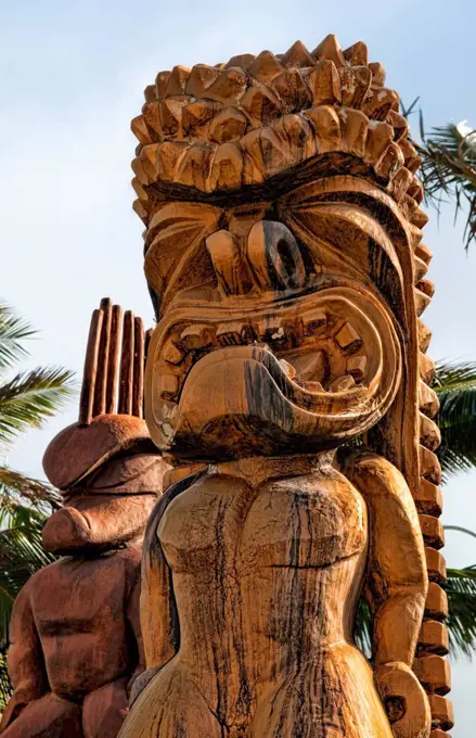 Hawaii, Oahu, Large Wooden Tiki Statues Greet Visitors Outside Of The Polynesian Cultural Center Entrance. Editorial Use Only.