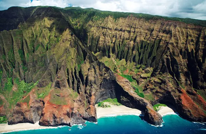 Hawaii, Kauai, Na Pali Coast, Aerial view of Honopu Valley sea arch and beach.