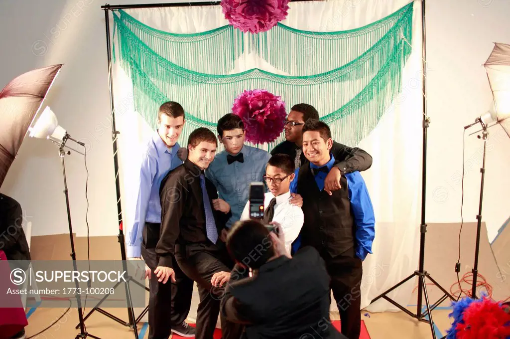 Teenagers posing for a group portrait at a birthday party