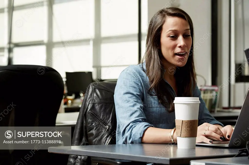 Young woman using laptop