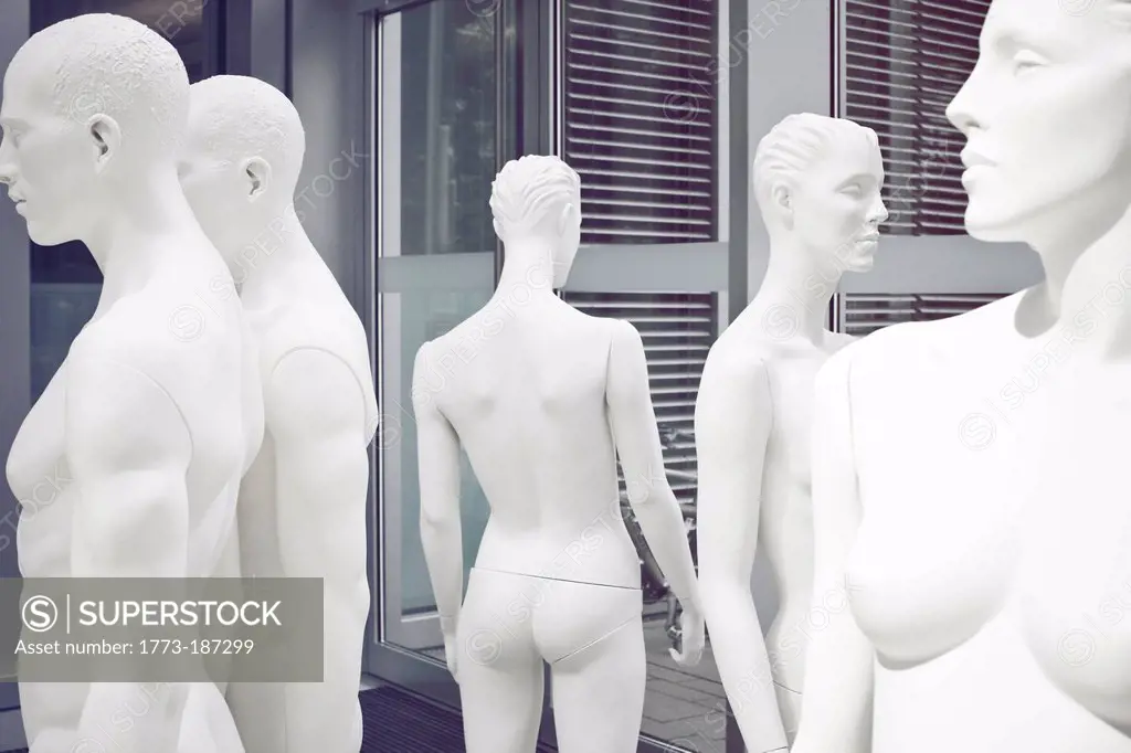 Naked mannequins standing in circle