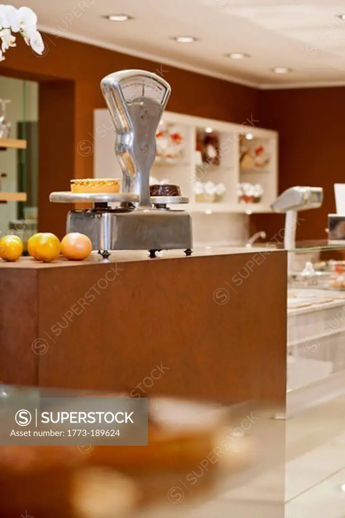 Cakes on scales in bakery
