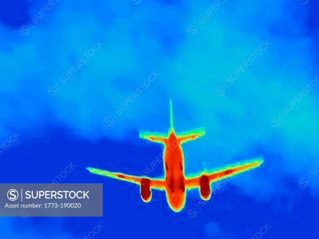 Thermal image of airplane in sky