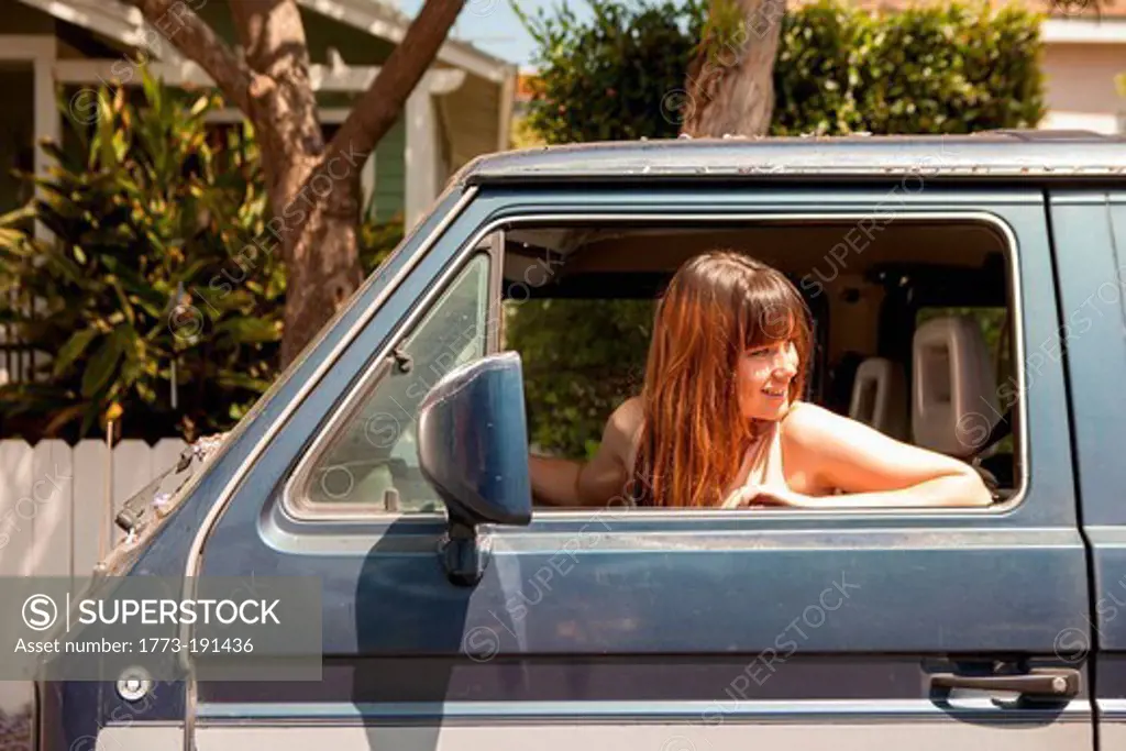 Young woman in a van
