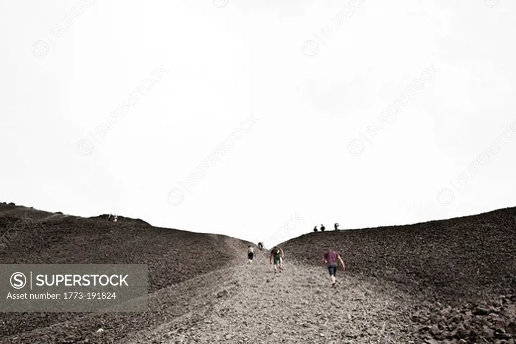 People walking rocky path, Black Tusk, Garibaldi Provincial Park, British Columbia, Canada