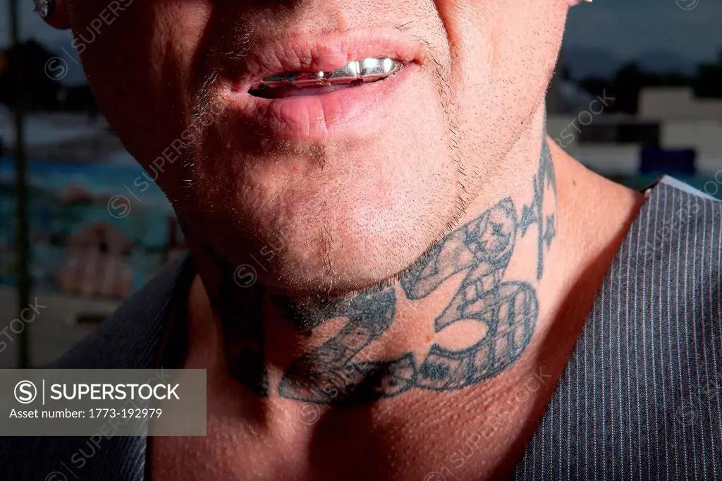 Man with tattooed neck