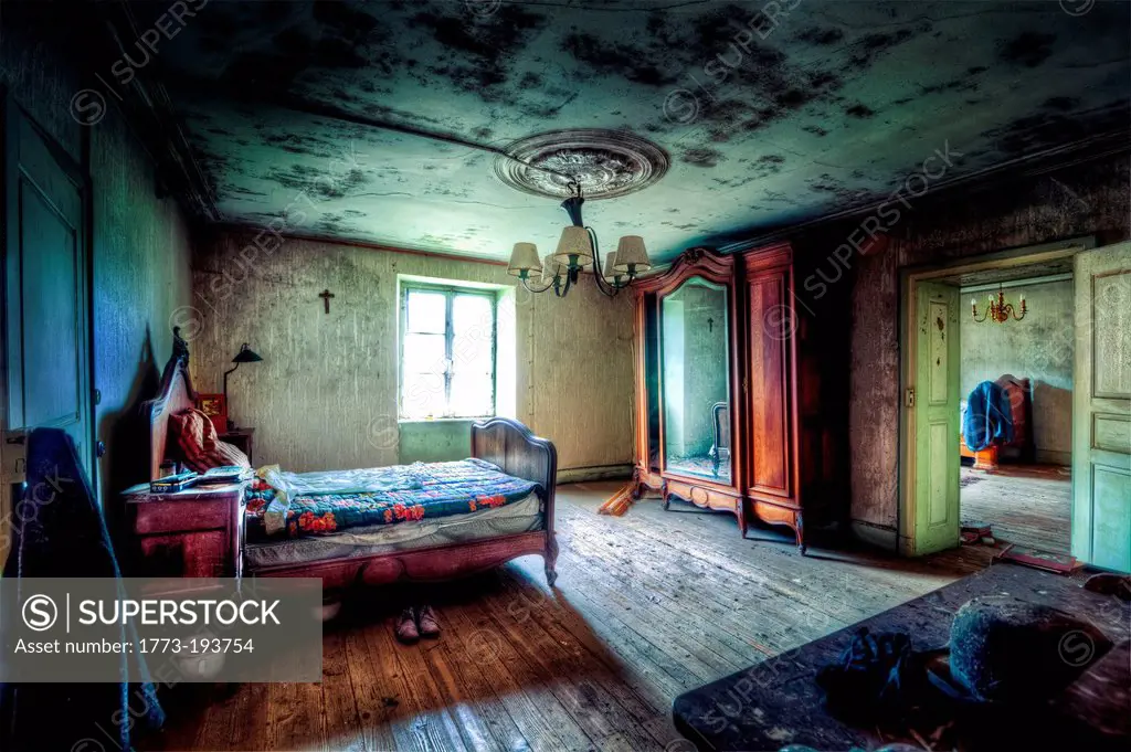 Bedroom in dilapidated house