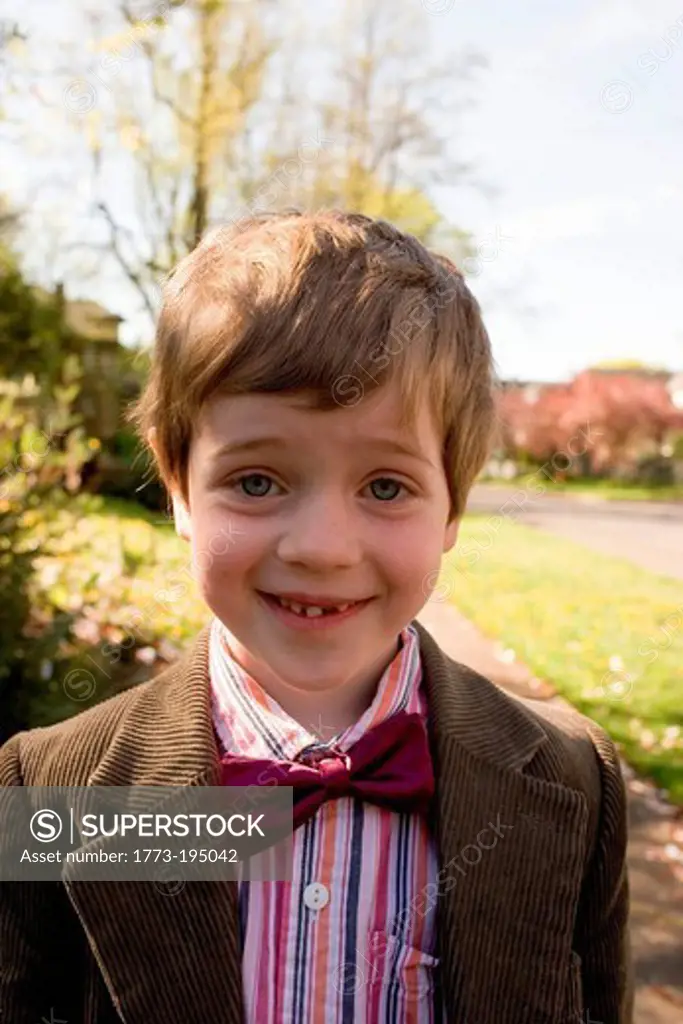 Portrait of boy wearing bow tie and jacket