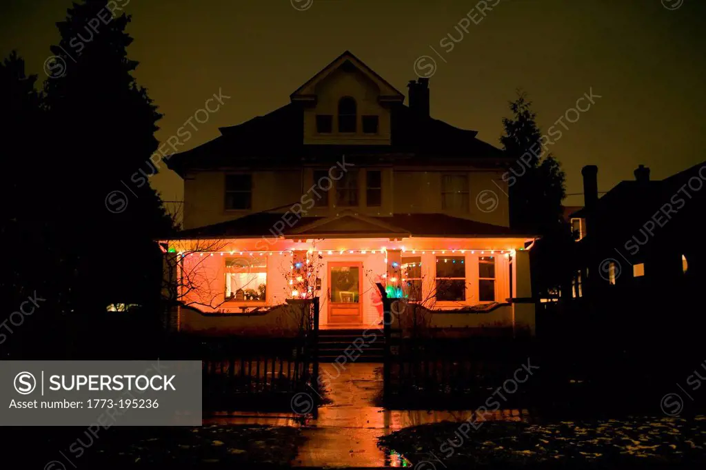 Christmas lights on house at night