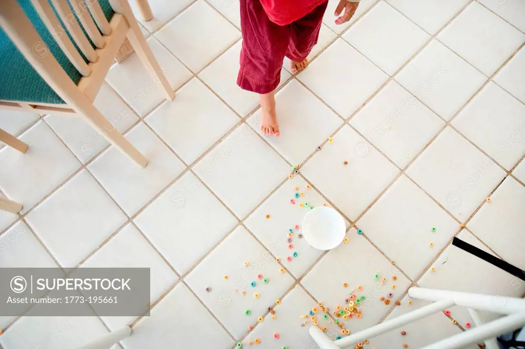 Breakfast cereal spilt on kitchen floor