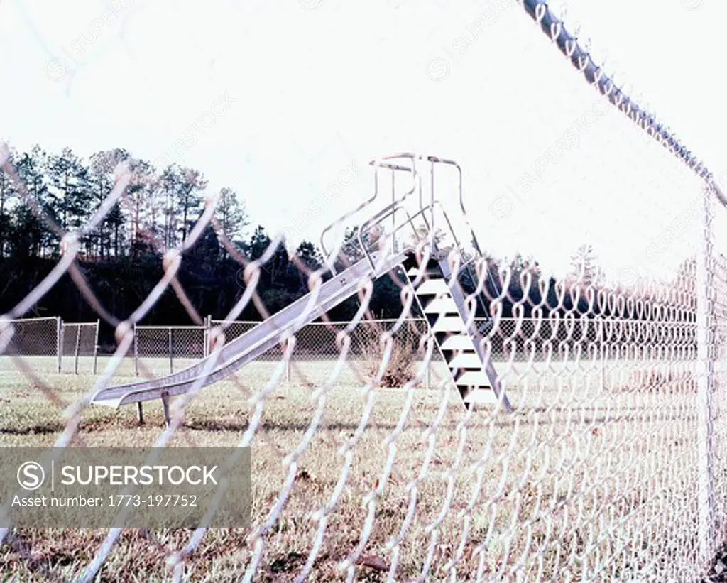Playground through chain link fence