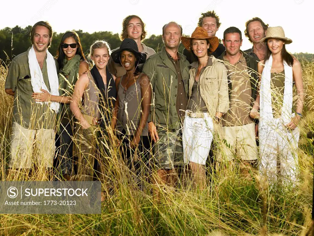 People dressed for a safari, smiling