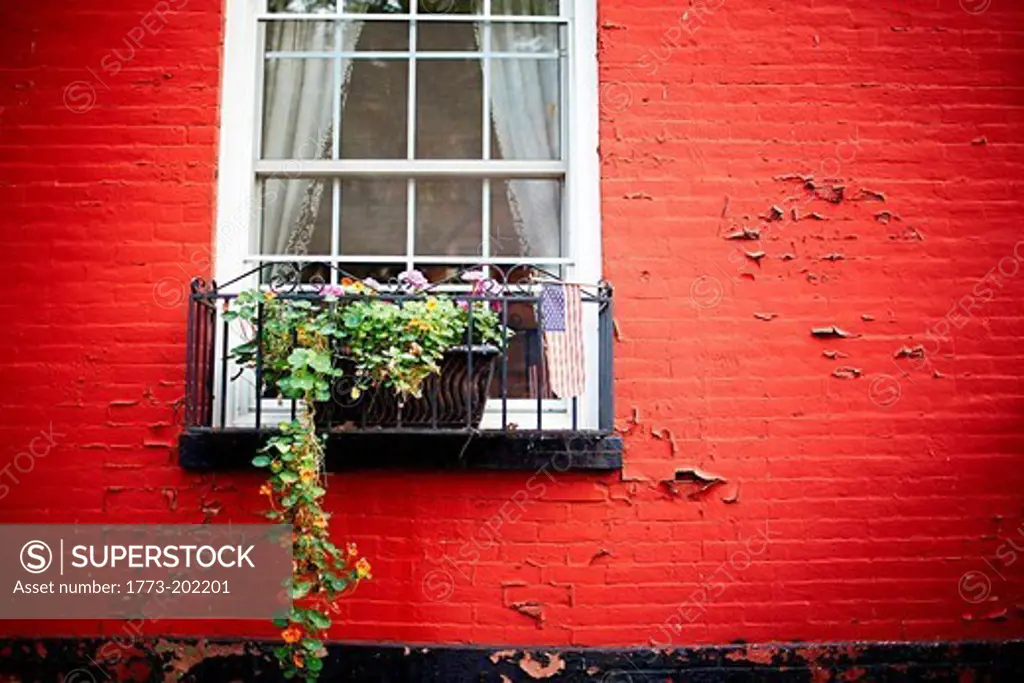 Window and red brick wall