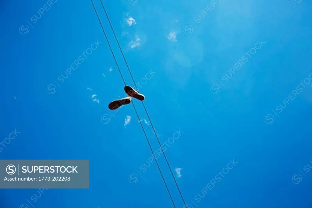 Pair of shoes caught on telephone line