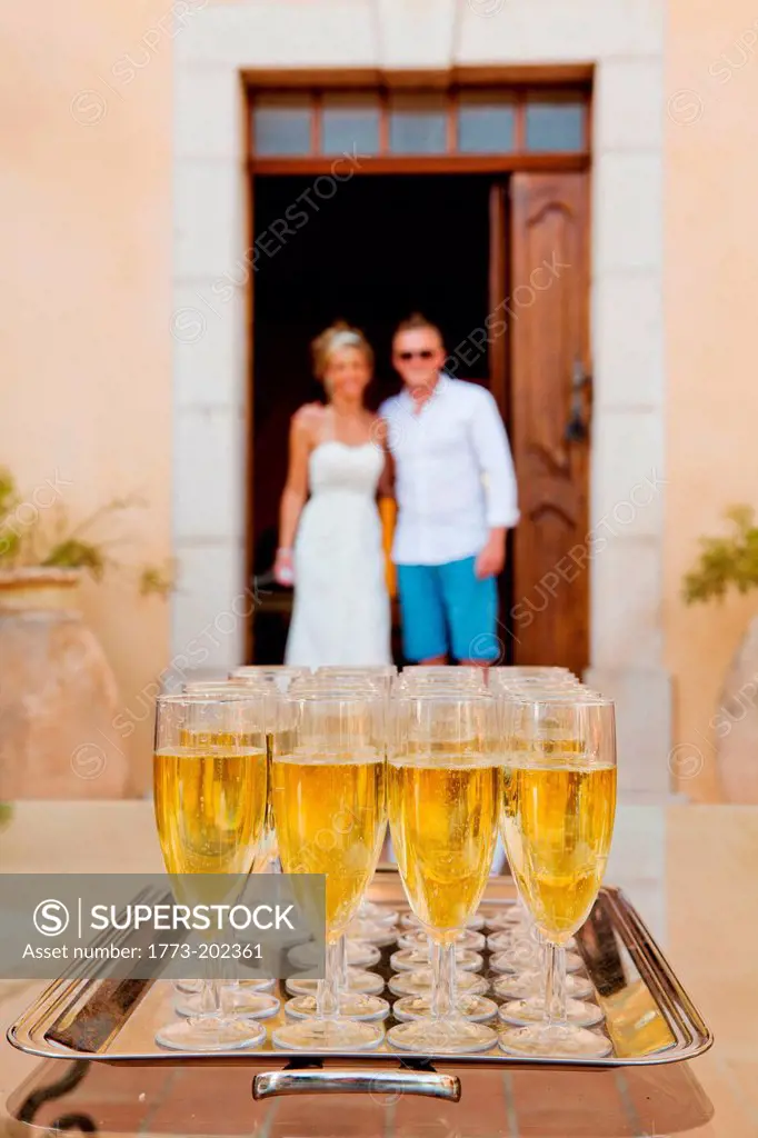 Tray of champagne at wedding reception
