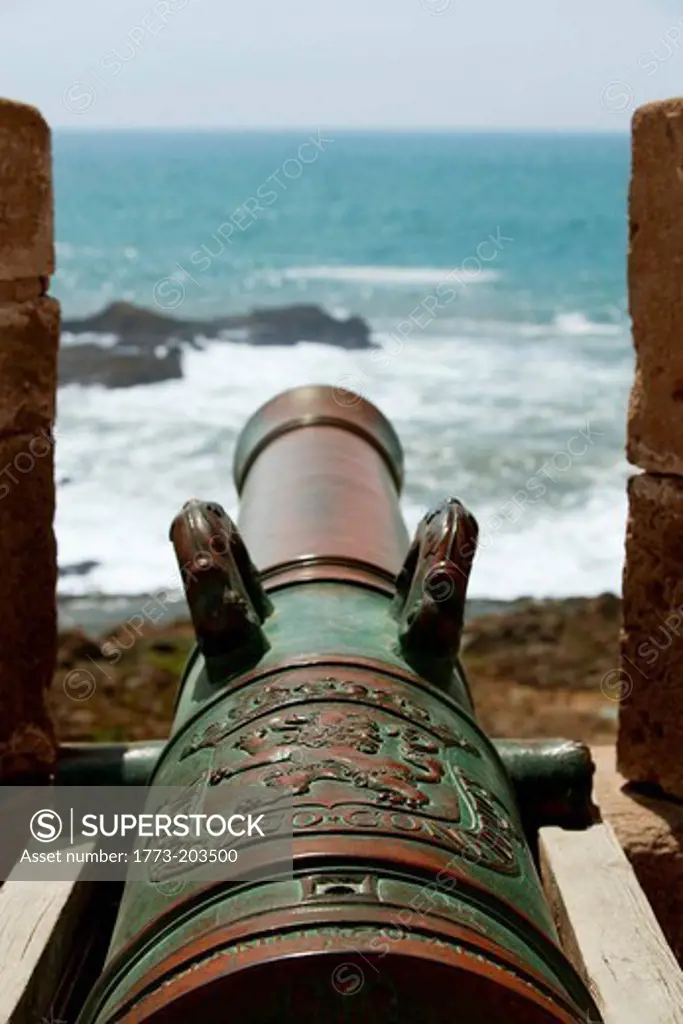An old canon on the ramparts of the medina walls at Essaouira in Morocco