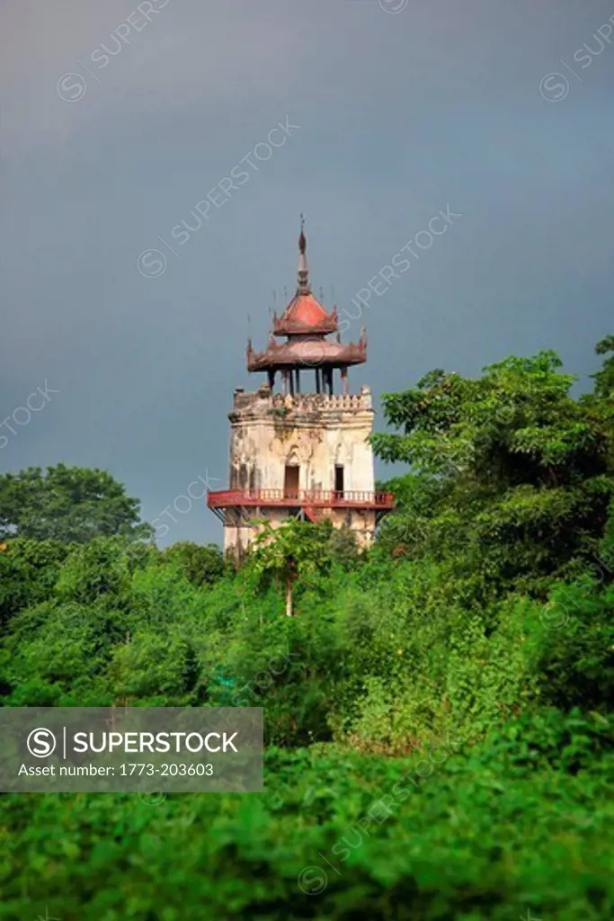 The Watch Tower in the ancient city of Ava, stands on a slant due to an earthquake in the 1800's, Myanmar