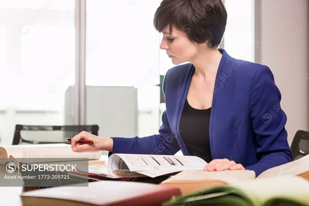 Female lawyer working at desk