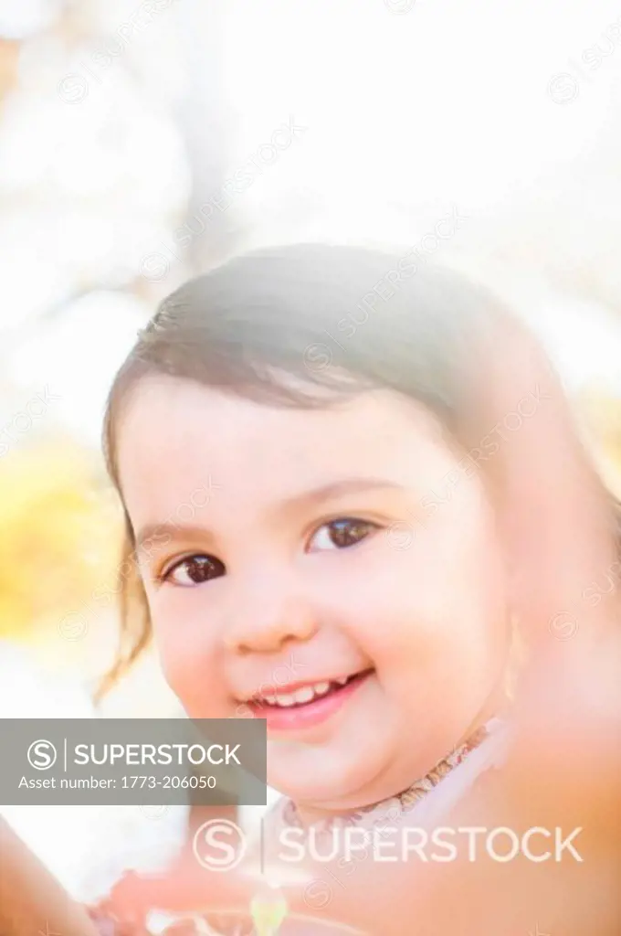 Close up view of child with toothy smile