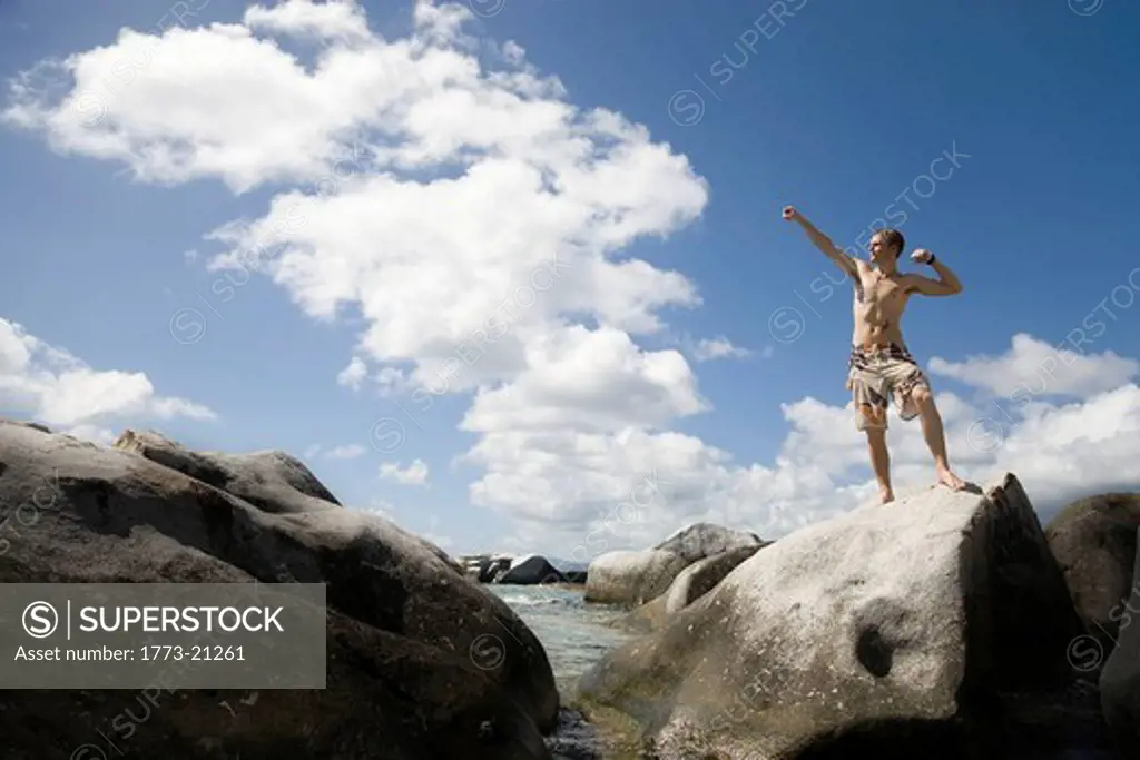 Man Standing on Rock