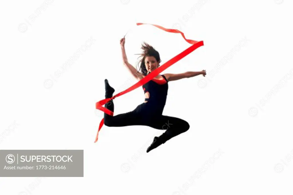 Dancer with ribbon on white background