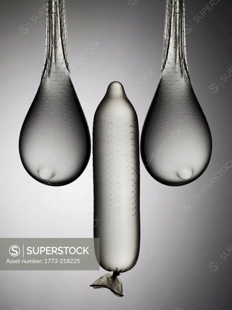 Still life of condoms suggesting male and female anatomy