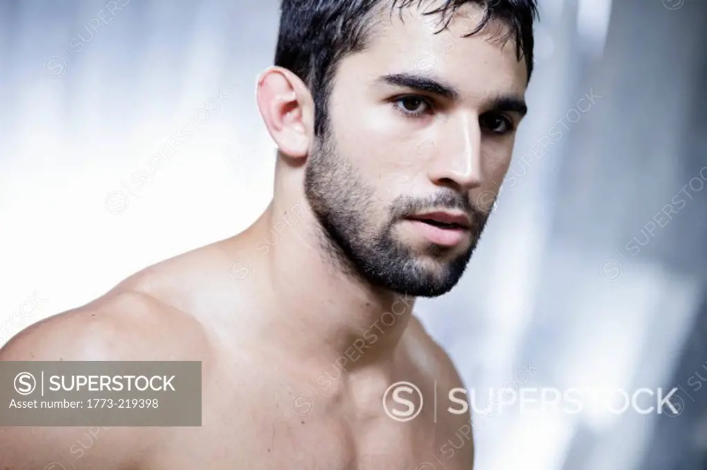 Portrait of barechested man with facial hair