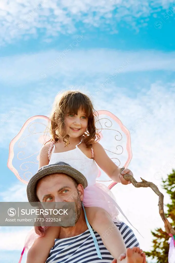 Father carrying daughter on shoulders, Eggergrund, Sweden