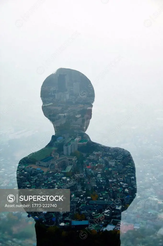 Businessman and Hong Kong cityscape, composite image