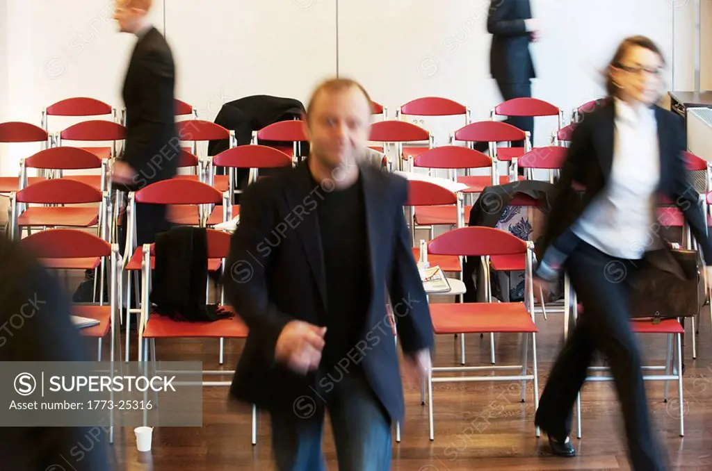 business people fleeing meeting