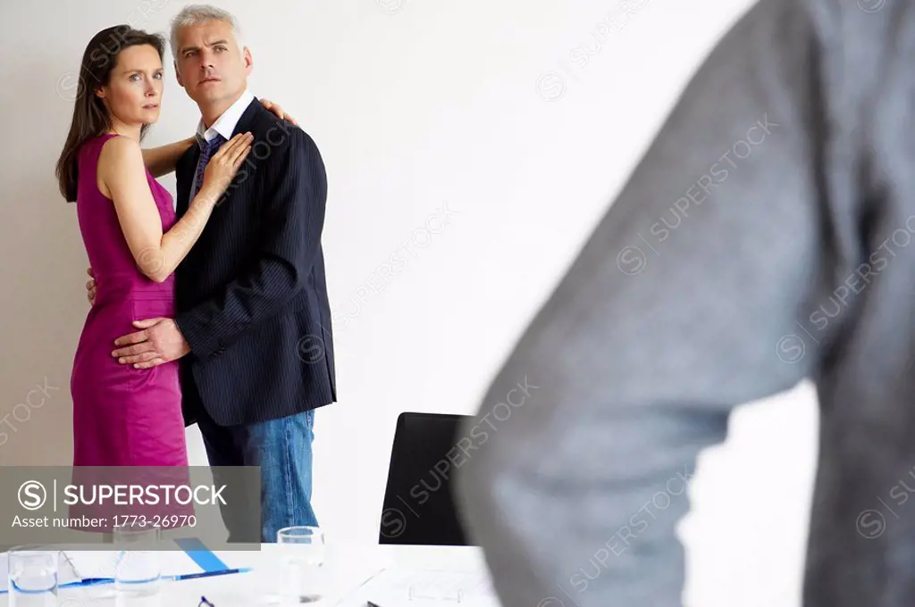 Couple caught at the office