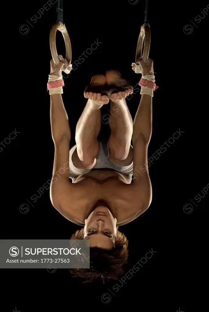 gymnast upside down on rings