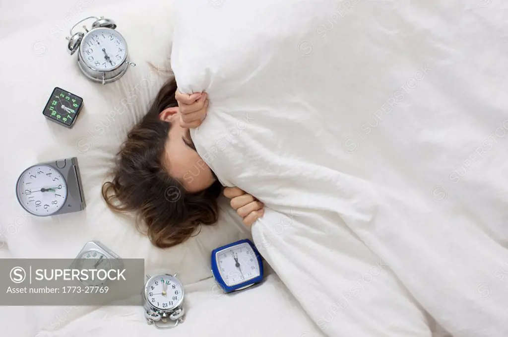 woman trying to get up in the morning